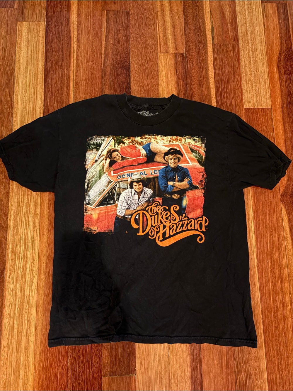 Warner Bros. Black The Dukes of Hazzard Graphic Tee with Orange Logo